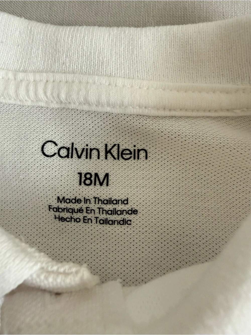 Calvin Klein White Polo Bodysuit with Gold Logo,size 12-18 months.